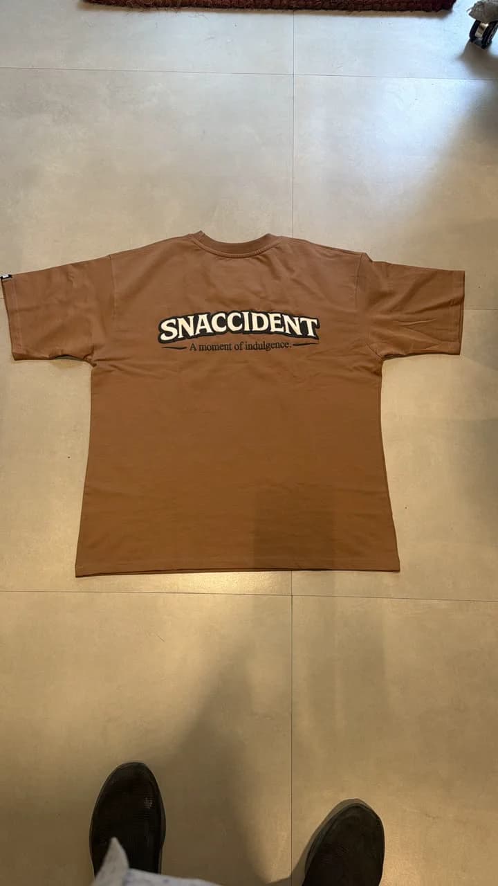 SNACCIDENT Signature Tee — back wordmark